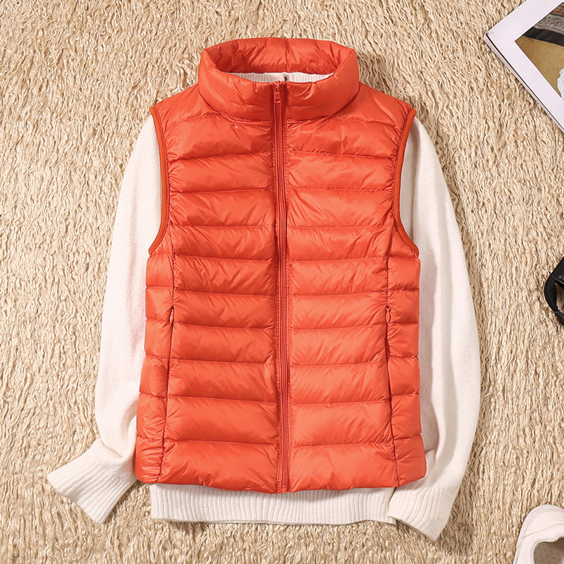 Amira™ | Chaleco ligero de plumas con diseño plisado