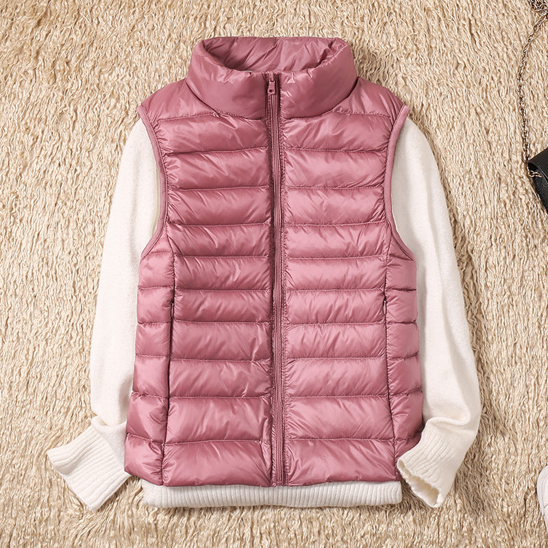 Amira™ | Chaleco ligero de plumas con diseño plisado